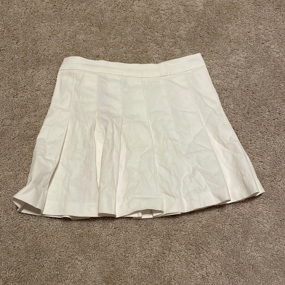 White pleated skirt
